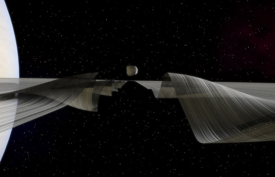 Дафнис — спутник-хулиган, летающий в кольцах Сатурна
