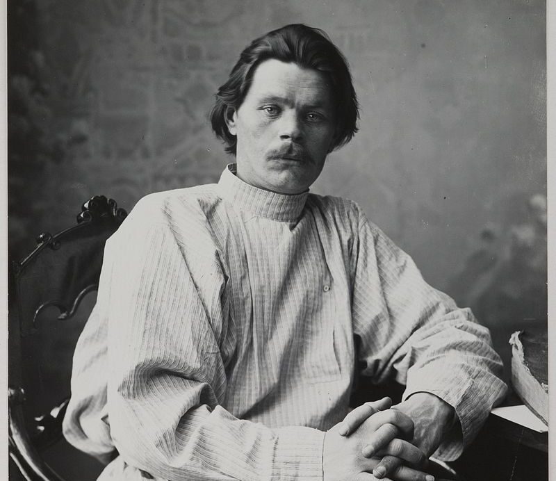Portrait of Maxim Gorky sitting in an armchair wearing a light shirt. 14728267252 e1607456833364 15